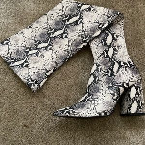 Knee high snake print boots from Steve Madden